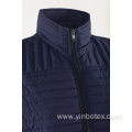 Navy quilted light vest with stand collar
